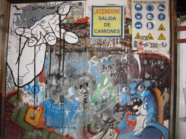 Spain, Zaragoza. Grafitti in a back lane.